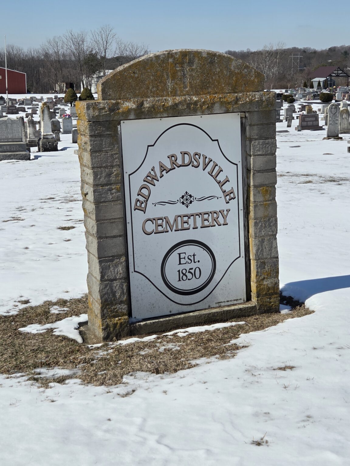 The Edwardsville Cemetery entrance sign in winter